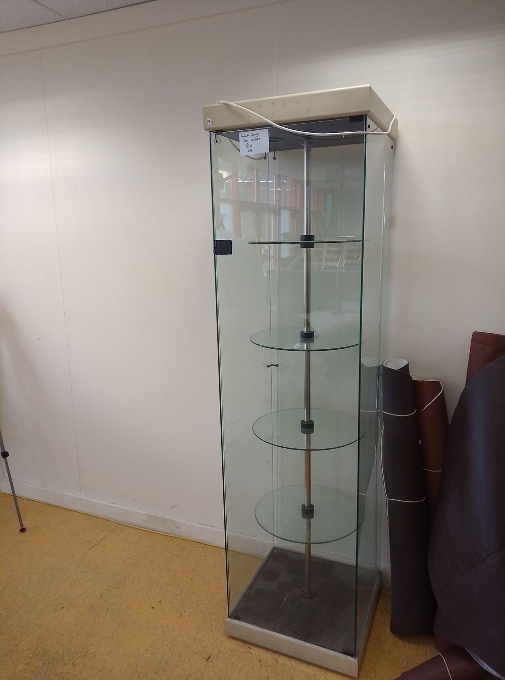 Lot 288: Contemporary Hexagonal Glass Display Cabinet with Rotating Shelves