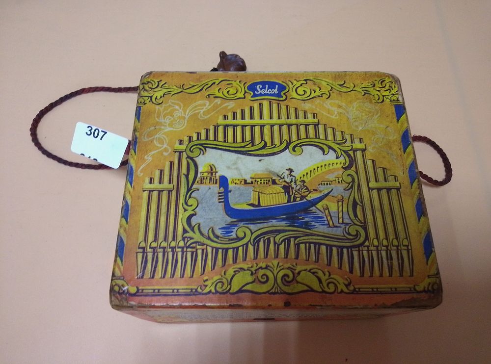 Lot 307: Vintage Select Brand Lithographed winding handle musical box...