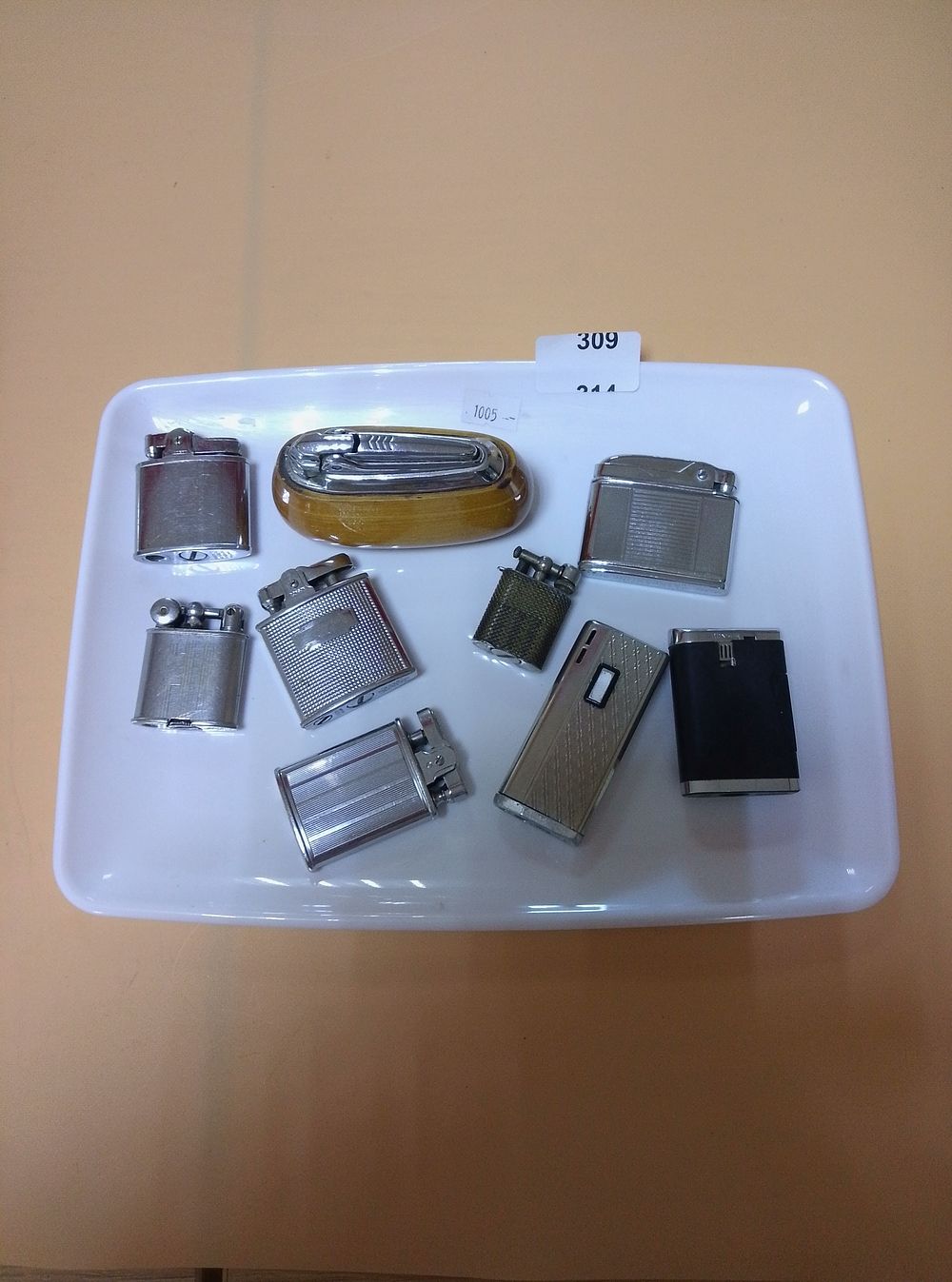 Lot 309: A Collection of Vintage Pocket and Table Lighters...