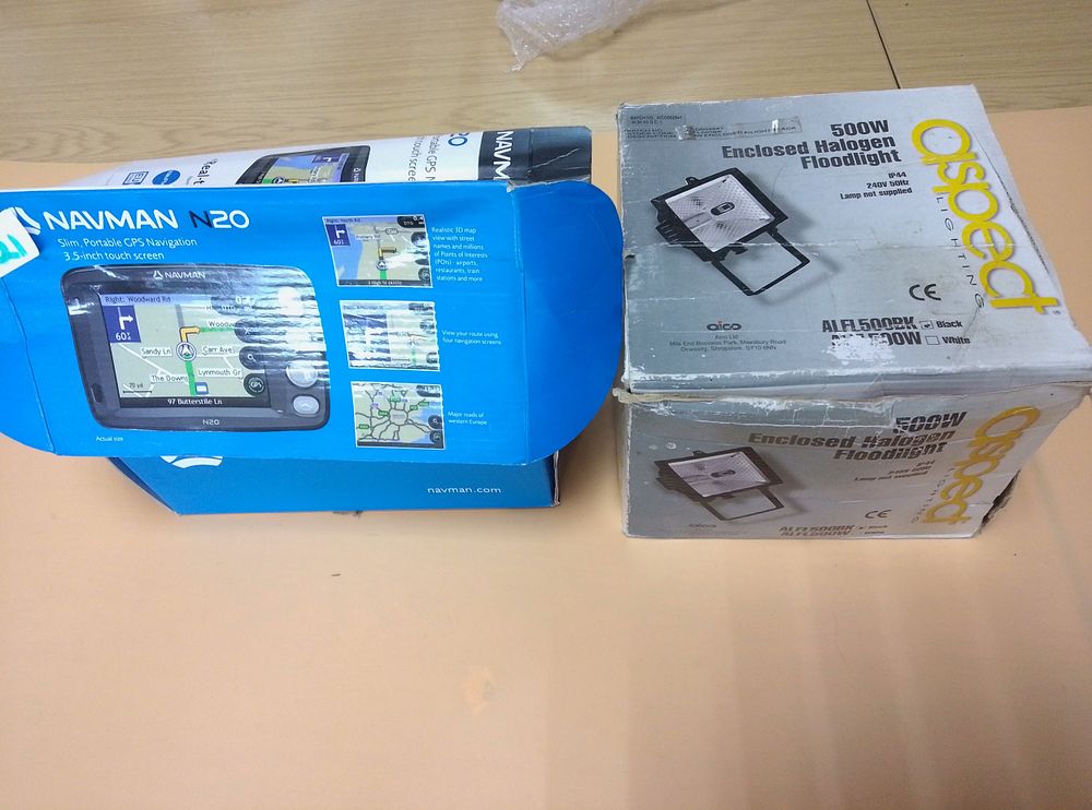 Lot 321: Two Boxed Electrical Items Including a Navman N20...