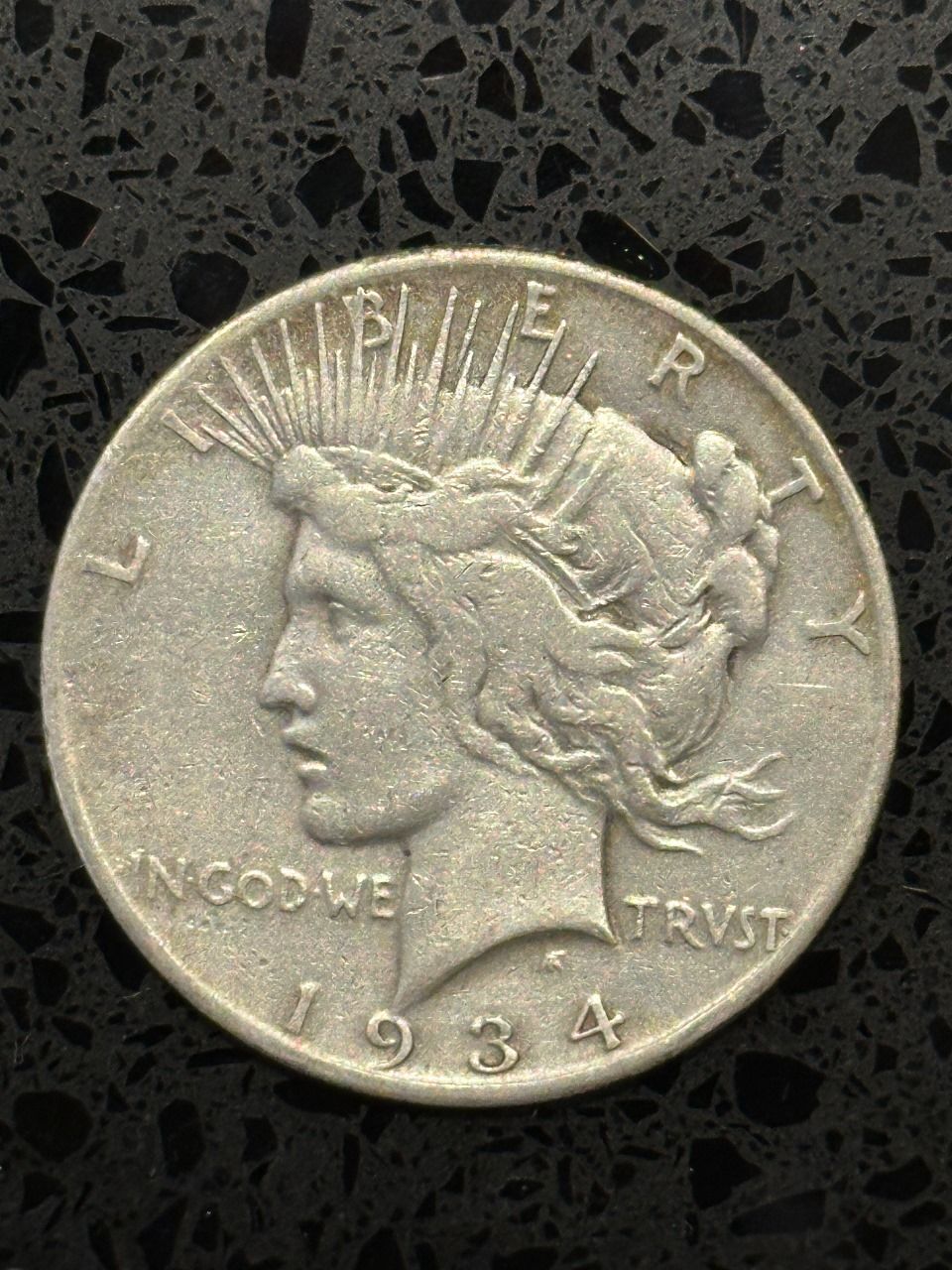 Lot 244: 1934 Peace Silver Dollar - F