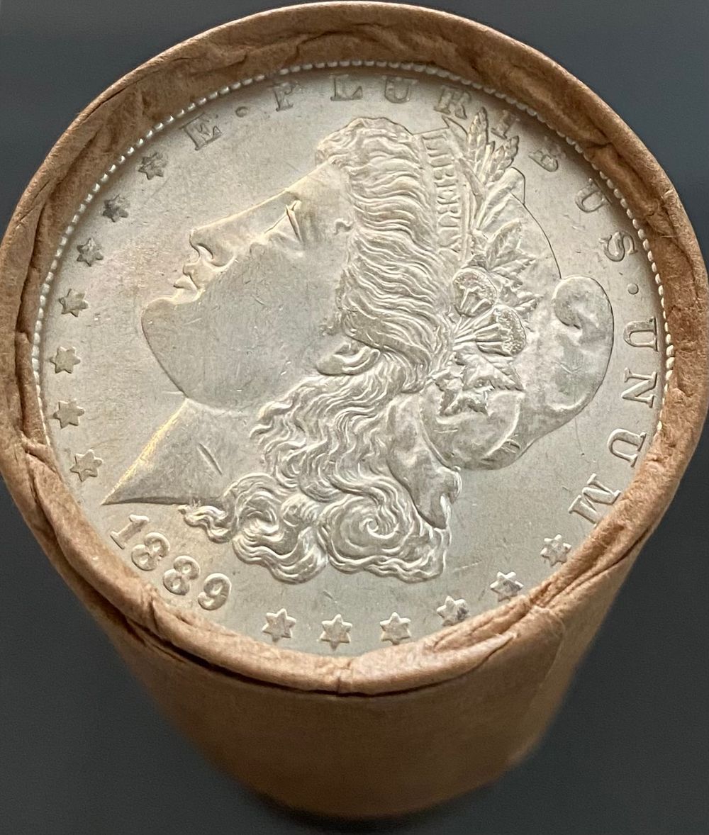 Lot 68: $10- Morgan Dollar BU 1899 & CC End