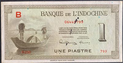 French Indochina 1 Piastre (1945) banknote with "B" stamp (P #76a). In AU, with ink spots