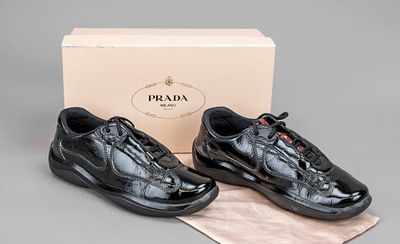 Prada, low-top sneakers, black patent leather and other materials, tongue with red logo patch 
