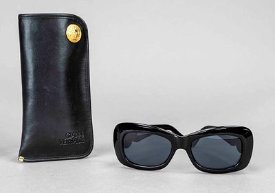 Gianni Versace, sunglasses, wide black plastic frame with wide temples and large gold-coloured 