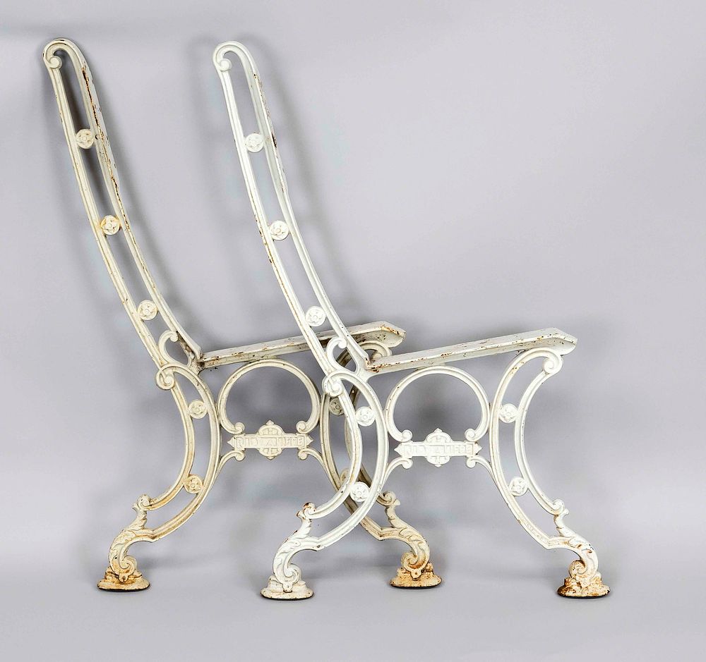 Frame for a garden bench, 19th/20th century, cast iron painted white. Openwork and ornamented 