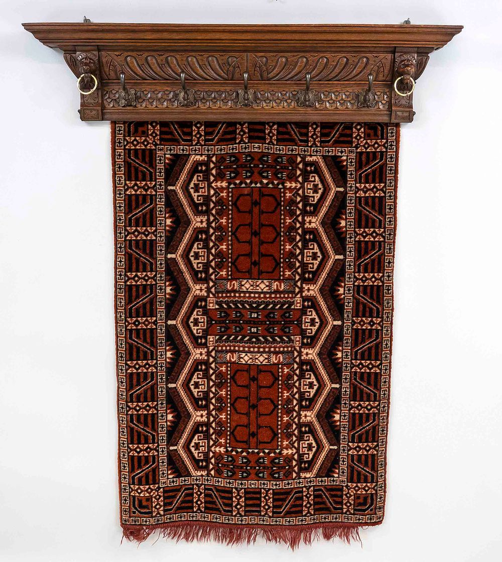 Wardrobe with carpet hanging, 19th/20th century, oak. In the form of a cornice with risalits 