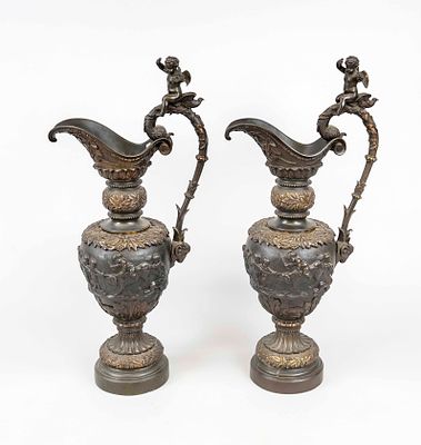 Pair of large historicist ceremonial jugs, late 19th century, bronze. Balustrade body with 