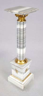 Column, 2nd half of the 20th century, gray marble. Profiled pedestal with decorative brass 