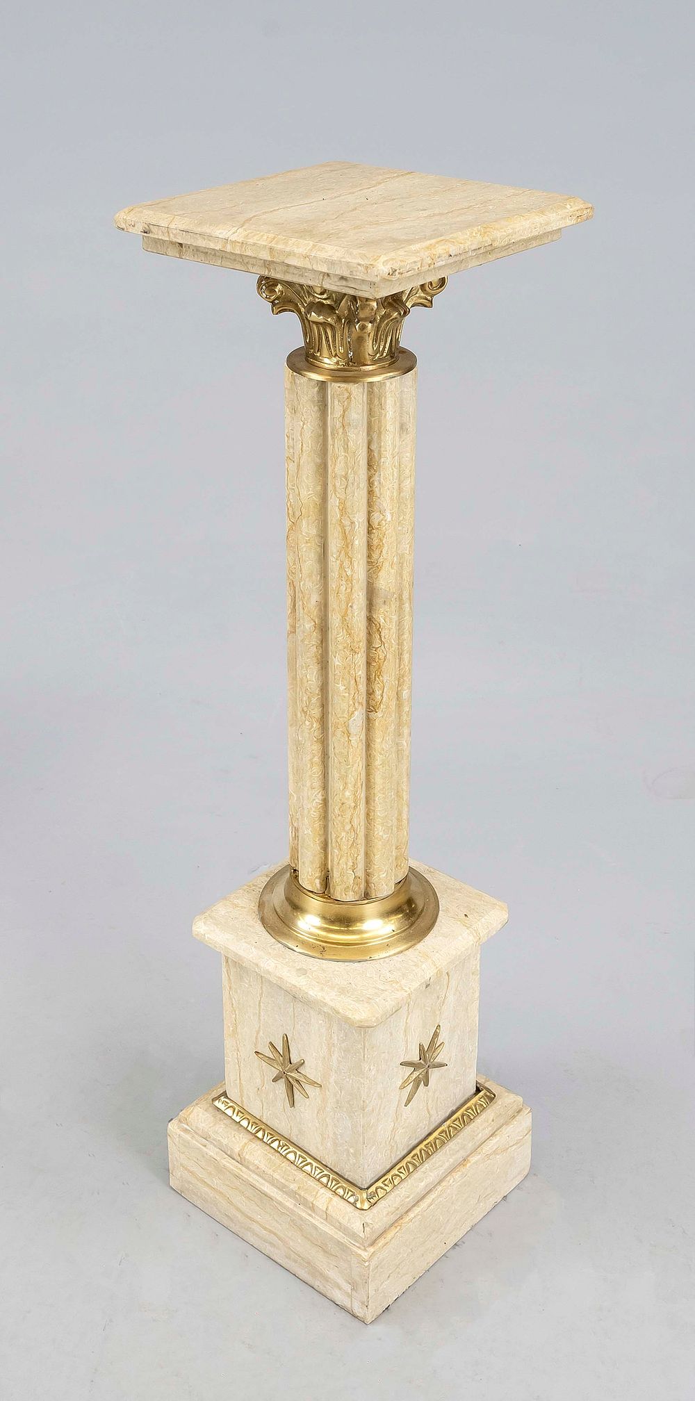 Column, 2nd half of the 20th century, shell limestone. Profiled pedestal with decorative brass 