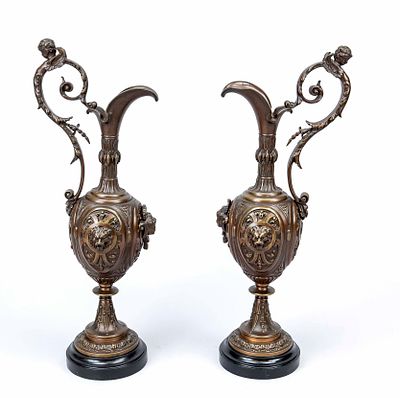 Pair of ornate side tables in the form of jugs, 19th century, bronze with dark patina. Putti on 