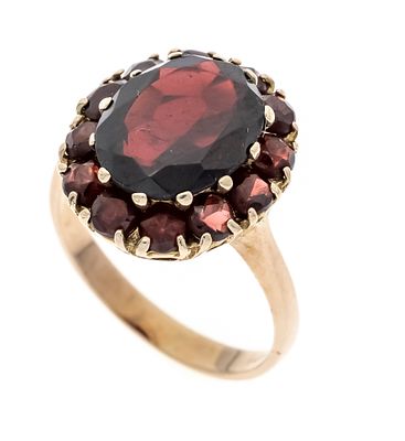 Granat-Ring GG 333/000 mit einem oval und rund fac. Granaten 11,2 x 9 und 3,1 mm, RG 50, 4,0 g