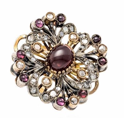 Granat-Diamant-Ring GG 585/000 und Silber, ungest., gepr., mit einem ovalen und 8 runden 