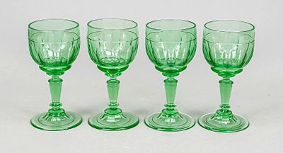 Four wine glasses, circa 1900, round domed base, conical stem, articulated bowl with olive cut 