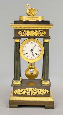 Portal clock, bronze burnished and fire-gilded, 2nd half of the 19th century, crowned by a swan 