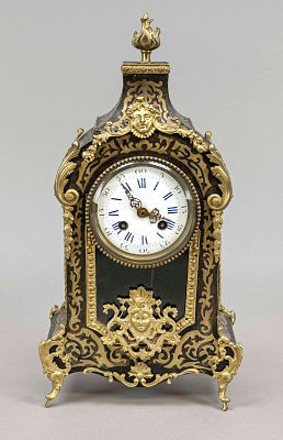 Boulle clock, black, 2nd half of the 19th century, with elaborate bronze decoration, crowned by 