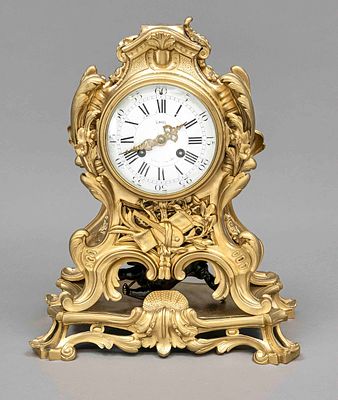 Bronze table clock on a solid base, 2nd half of the 19th century, color-gilded, indistinctly 