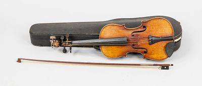 Violin in case, 19th/20th century, Stradivari label in the body, with bow. Rubbed. Body length 