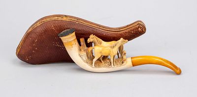 Meerschaum pipe in case, circa 1900, curved shape, body carved with two fully sculpted horses 