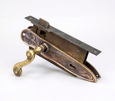 Art Nouveau door handle set with lock case, panel with floral, understated decoration, curved 
