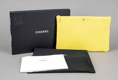 Chanel, flat document or tablet bag, sun-yellow V-shaped quilted leather, silver-colored 