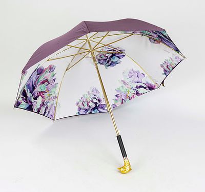 Stylish umbrella, metal shaft with plastic cover, handle in the shape of a fully sculpted 