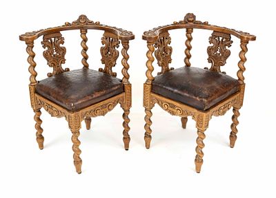 Paar Gründerzeit-Eckstühle um 1880, Eiche, zeittypisch geschnitzt, plastischer Puttokopf 