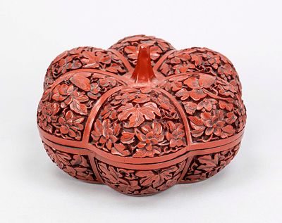 Reproduction of a red carved lacquer lid box in the shape of a pumpkin, China, 20th century 