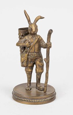 Figurative match holder, circa 1900, in the form of an anthropomorphic hare in hiking gear with 
