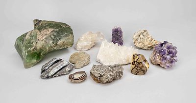 Large collection of fossils and crystal specimens, including amethyst, rock crystal, layered 