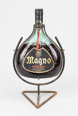 Large bottle of Brandy Magno Osborne Puerto De St. Maria, probably from the 1960s, in metal 