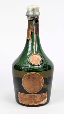 Bottle of Benedictine DOM herbal liqueur, 1st half of the 20th century, top closure with tin 