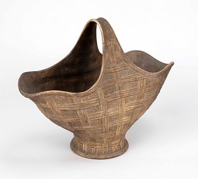 Handle basket, around 1900, ceramic, blue matt glaze, relief imitating woodwork. H. 24 cm