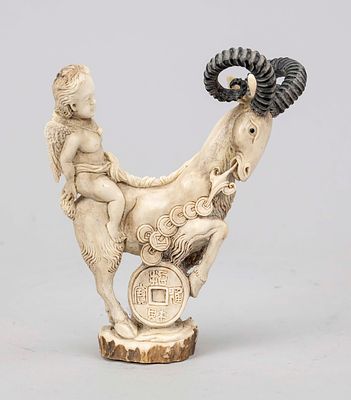 Carved putto on a billy goat, 2nd half of the 20th century, deer antler. Fully sculpted, with 