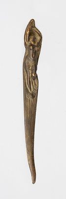 Art Nouveau letter opener, France, circa 1900, bronze. Handle in the form of a fully sculpted 