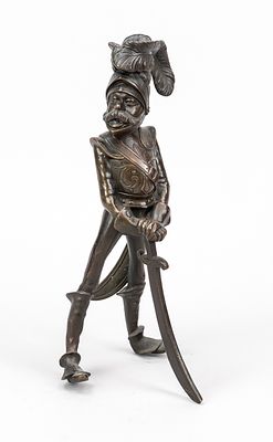 Figurative candlestick, 2nd half of the 19th century, bronze/brass with dark patina. 