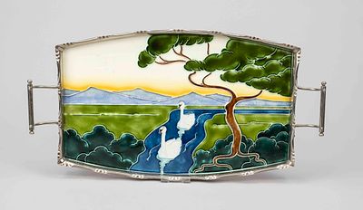 Tray, circa 1900, polychrome glazed ceramic, relief depiction of a river landscape with two 