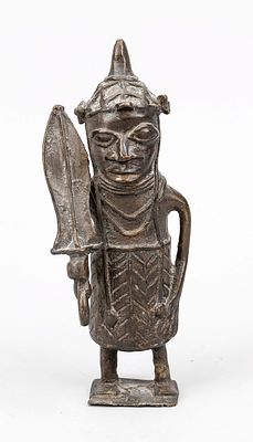 Warrior from Benin, Nigeria, 19th/20th century, bronze/brass. Man with oversized sword 