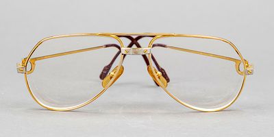 Cartier, reading glasses, narrow gold-colored metal frame with thin temples, lenses with 