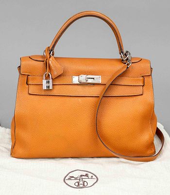 Hermes, Kelly Bag Retourne 32, orange coarse-grained leather, silver-colored hardware, short 
