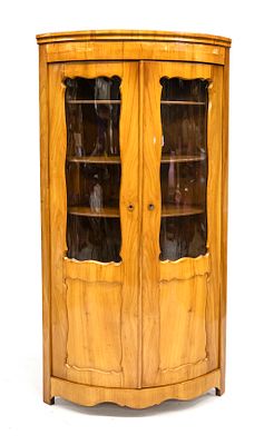 Glass corner cabinet, late Biedermeier, circa 1840, cherry wood, two curved doors with glass 