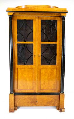 Biedermeier-style display cabinet, circa 1900, partially ebonized birch, 2-door body with 