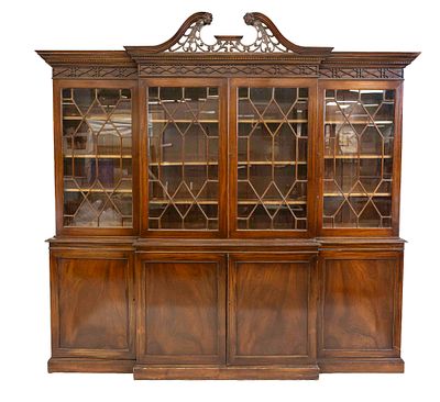 Very large English bookcase, 20th century, mahogany, 4-door glazed top section with carved 