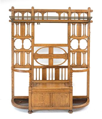Large Art Nouveau coat rack with chest bench, circa 1910, oak, bench with hinged lid, flanked 