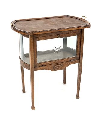 Tea cabinet, circa 1930, oak, fully glazed body with folding door and removable tray, 77 x 72 x 