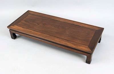 Low table, China, 19th/20th century, dark, finely grained hardwood. Ornamentally carved legs 