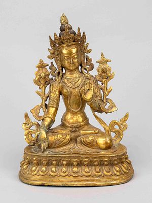 White Tara, Tibet, 20th century, gilded bronze. In Padmasana on a lotus base. Base plate with 