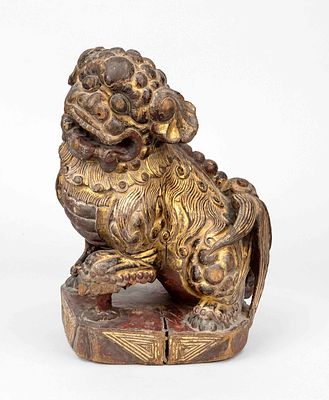 Fo lion, China, probably 19th century, wood with remnants of gilding. Stress cracks (stable) 