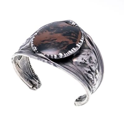 Open silver-plated bangle with black-brown gemstone, W. 46 mm, interior 59 x 45 mm, 54 g