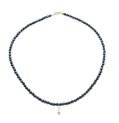 Hematite necklace with feather ring and center section GG 585/000 set with a 0.10 ct 